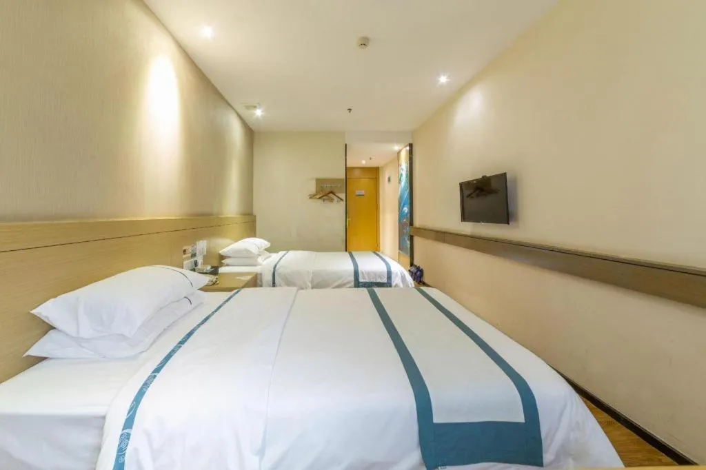 Bed in City Comfort Inn Zhuhai Qinglv Middle Road Riyuebei Grand Theater