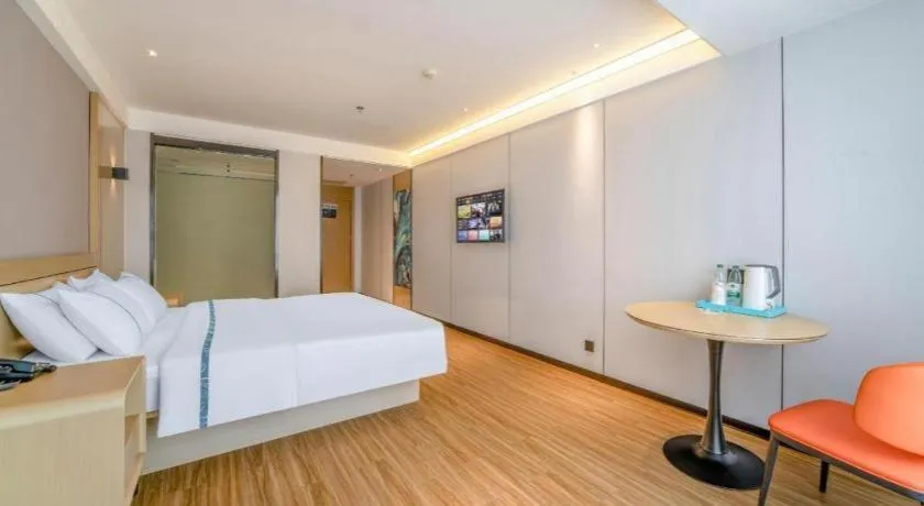 Bed in City Comfort Inn Zhanjiang Xuwen Port Wharf Passenger Station