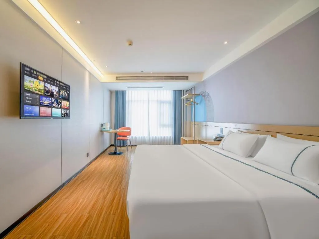 Bed in City Comfort Inn Zhanjiang Xuwen Port Wharf Passenger Station
