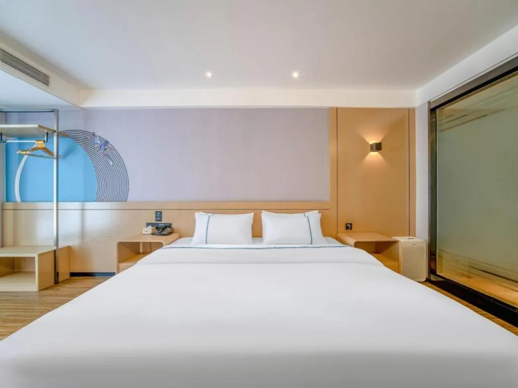 Bed in City Comfort Inn Zhanjiang Xuwen Port Wharf Passenger Station