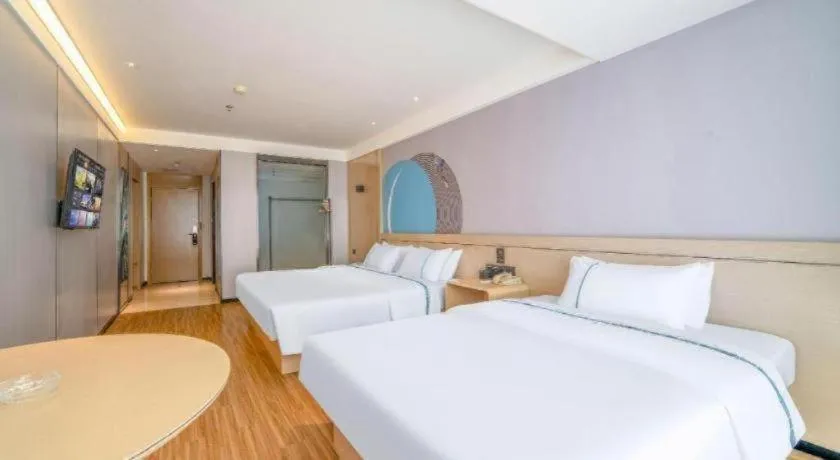 Bed in City Comfort Inn Zhanjiang Xuwen Port Wharf Passenger Station
