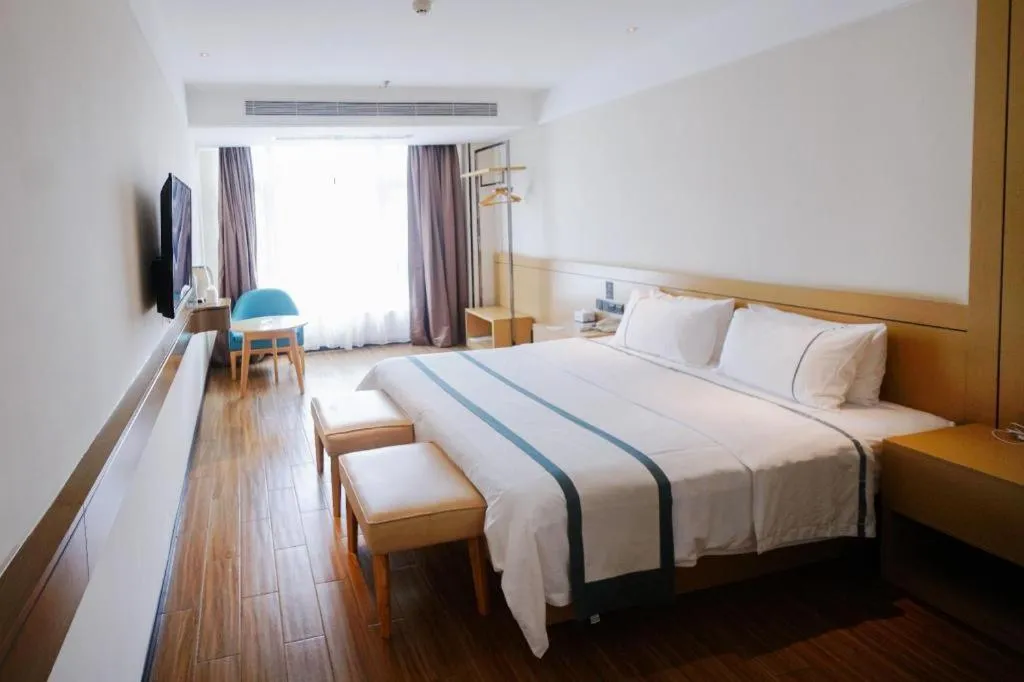 Bed in City Comfort Inn Zhanjiang Xuwen Port Wharf Passenger Station