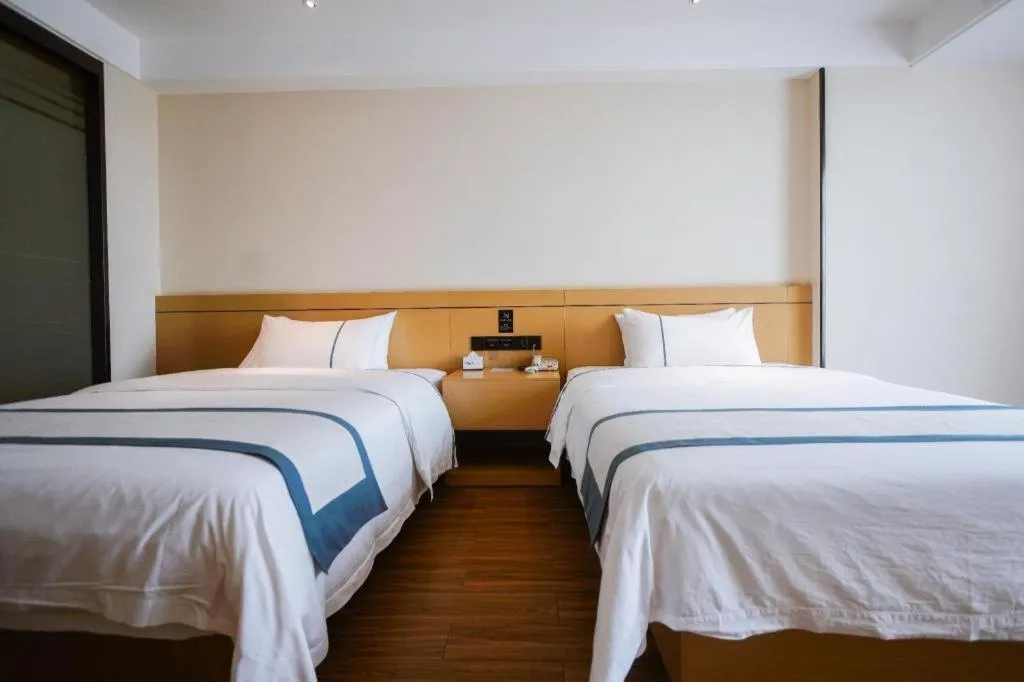 Bed in City Comfort Inn Zhanjiang Xuwen Port Wharf Passenger Station