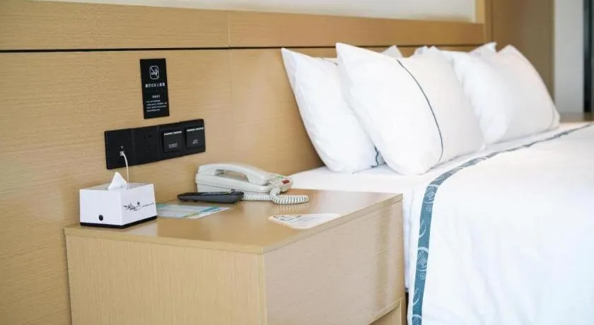 Bed in City Comfort Inn Zhanjiang Xuwen Port Wharf Passenger Station