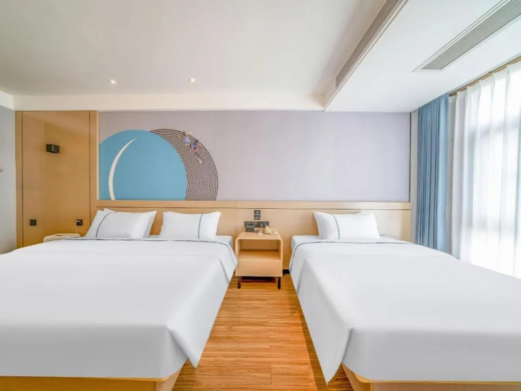 Bed in City Comfort Inn Zhanjiang Xuwen Port Wharf Passenger Station