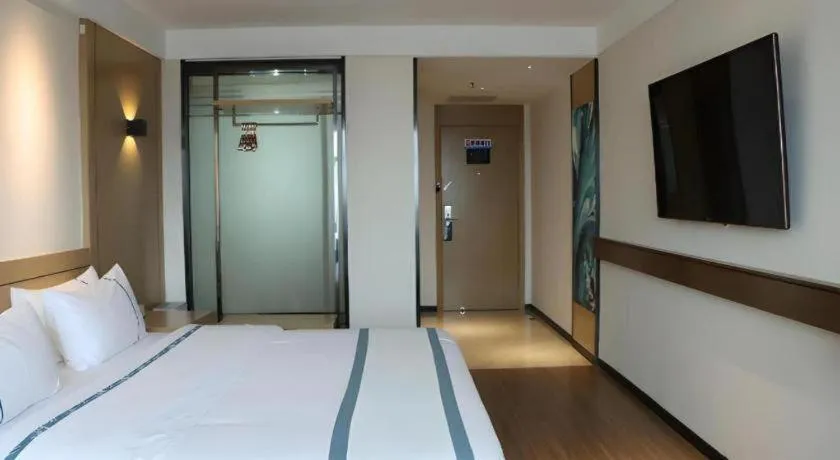 Bed in City Comfort Inn Zhanjiang Xuwen Port Wharf Passenger Station