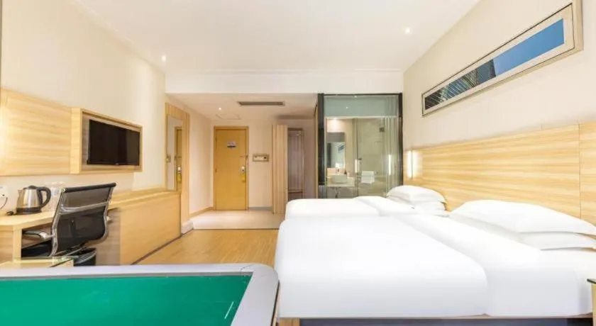 Bed in City Comfort Inn Jingmen Zhongjian Jinxiang Square