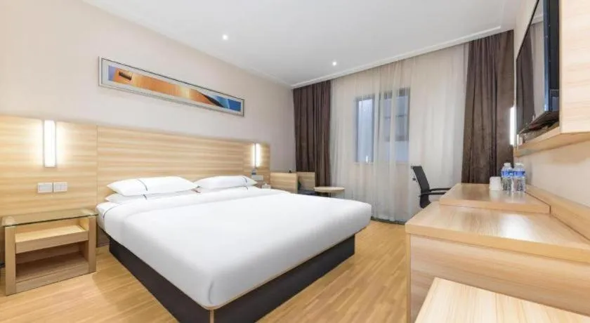 Bed in City Comfort Inn Jingmen Zhongjian Jinxiang Square