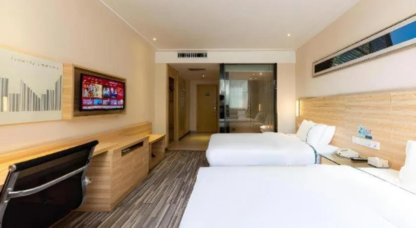 Bed in City Comfort Inn Jingmen Zhongjian Jinxiang Square