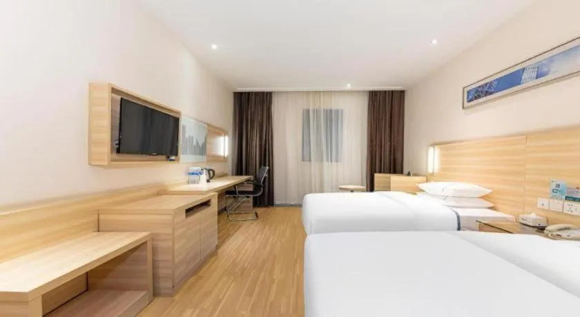 Bed in City Comfort Inn Jingmen Zhongjian Jinxiang Square