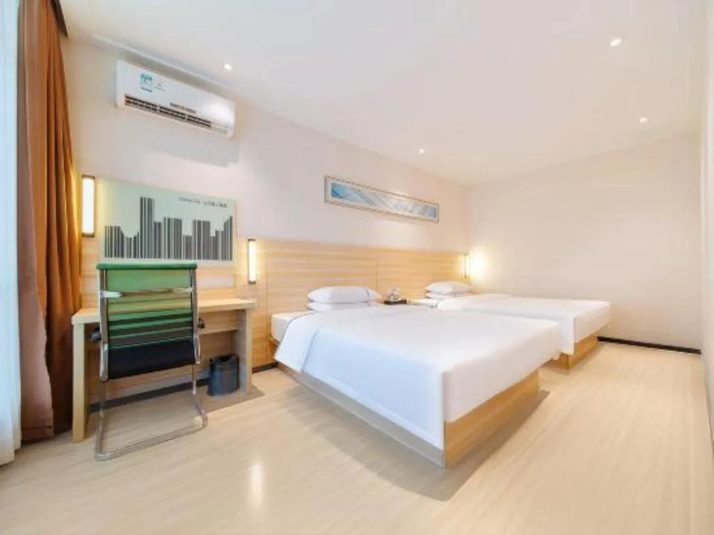 Bed in City Comfort Inn Maoming Xinyi Yudu Park