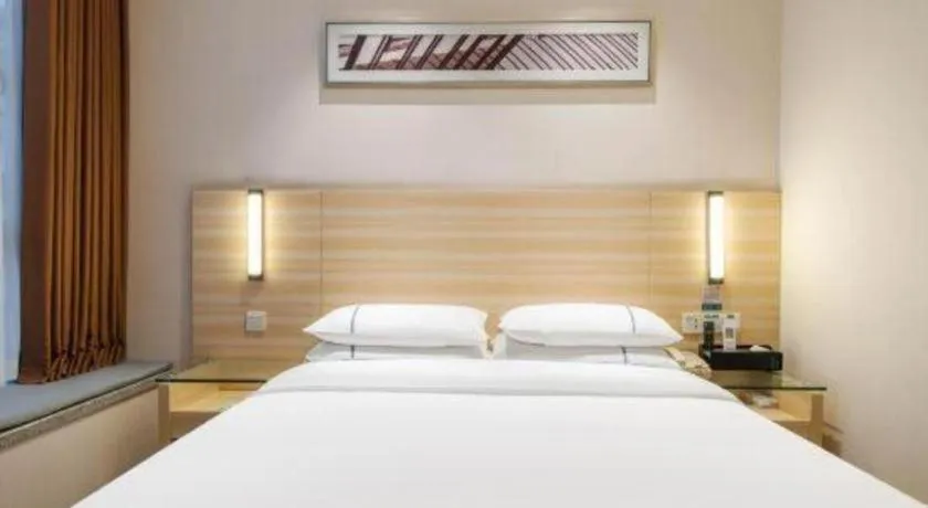 Bed in City Comfort Inn Maoming Xinyi Yudu Park