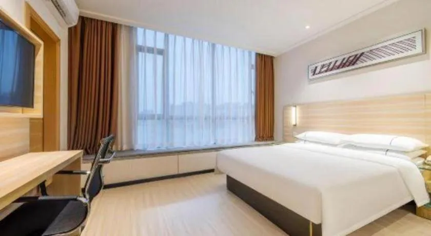 Bed in City Comfort Inn Maoming Xinyi Yudu Park