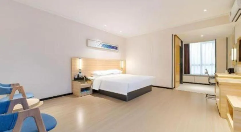 Bed in City Comfort Inn Maoming Xinyi Yudu Park