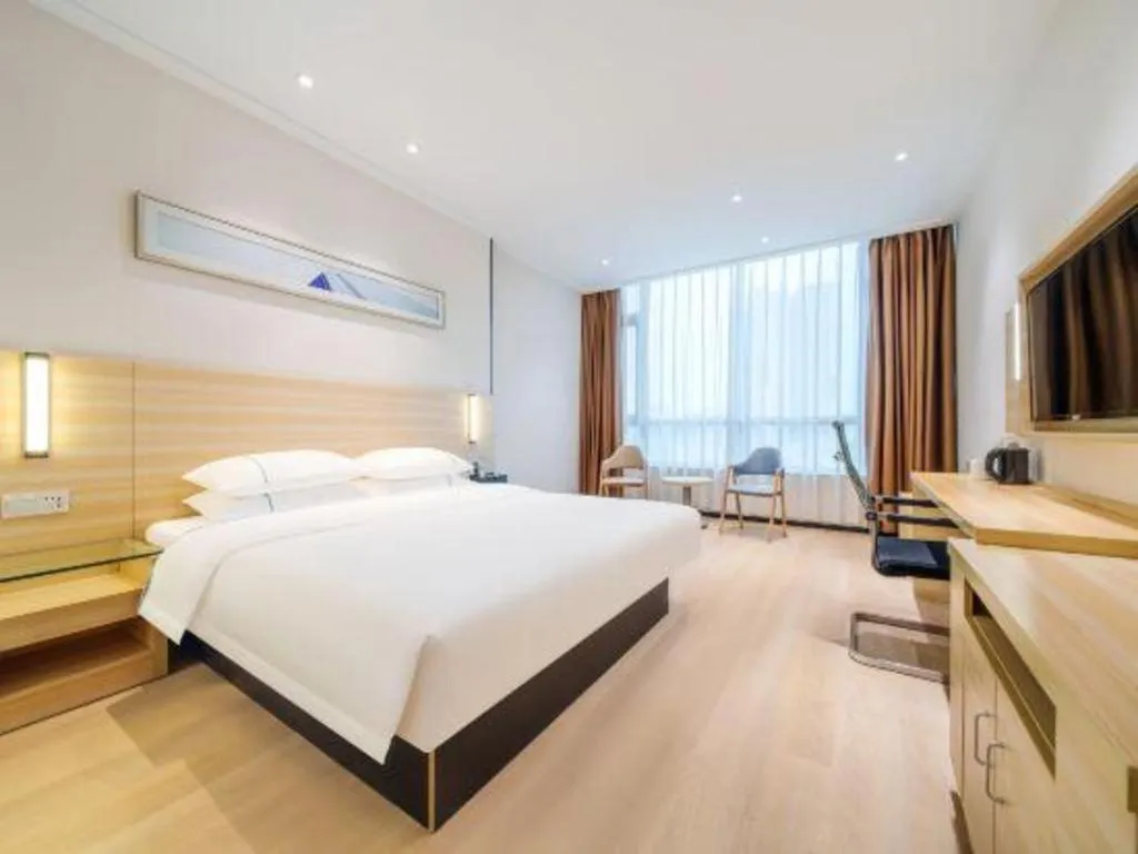 Bed in City Comfort Inn Maoming Xinyi Yudu Park
