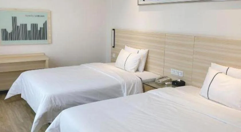 Bed in City Comfort Inn Maoming Xinyi Yudu Park