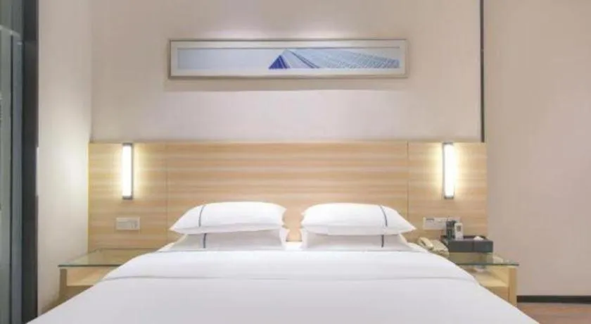 Bed in City Comfort Inn Maoming Xinyi Yudu Park