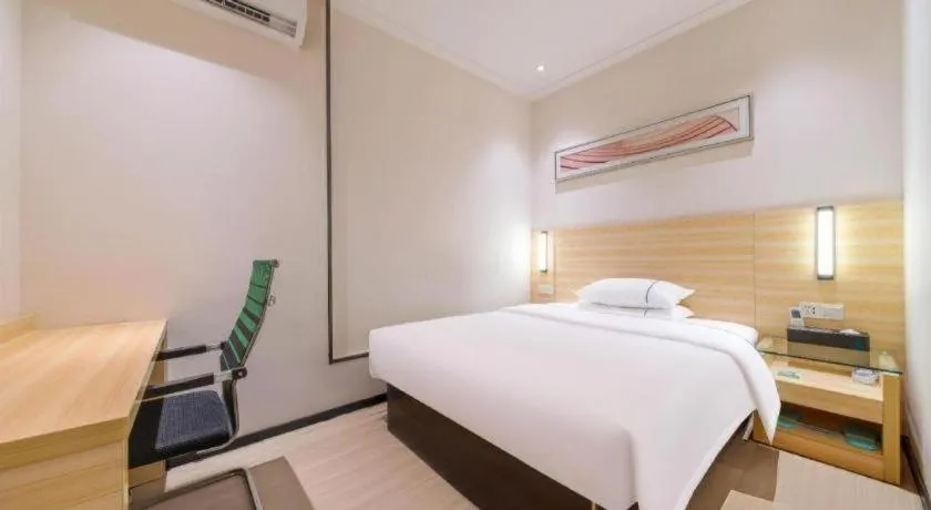 Bed in City Comfort Inn Maoming Xinyi Yudu Park