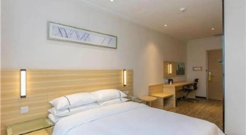 Bed in City Comfort Inn Maoming Xinyi Yudu Park