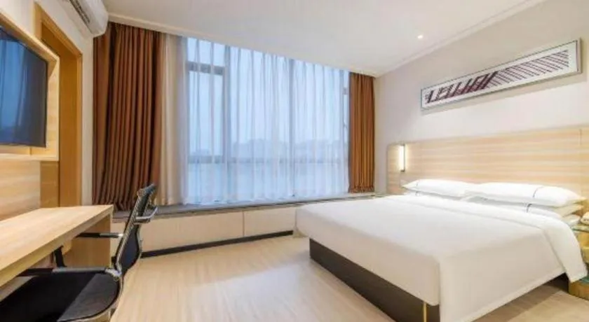 Bed in City Comfort Inn Maoming Xinyi Yudu Park