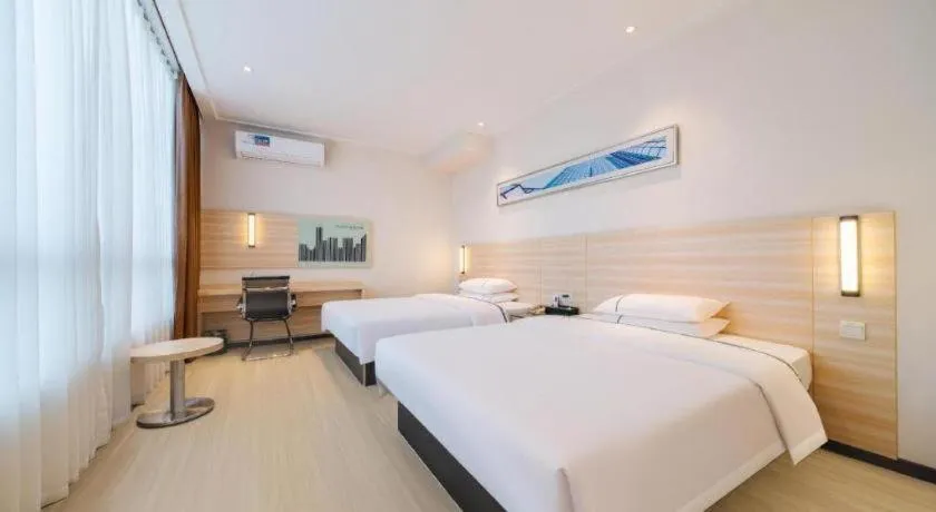 Bed in City Comfort Inn Maoming Xinyi Yudu Park