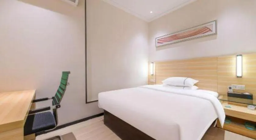 Bed in City Comfort Inn Maoming Xinyi Yudu Park