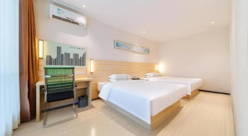 Bed in City Comfort Inn Maoming Xinyi Yudu Park
