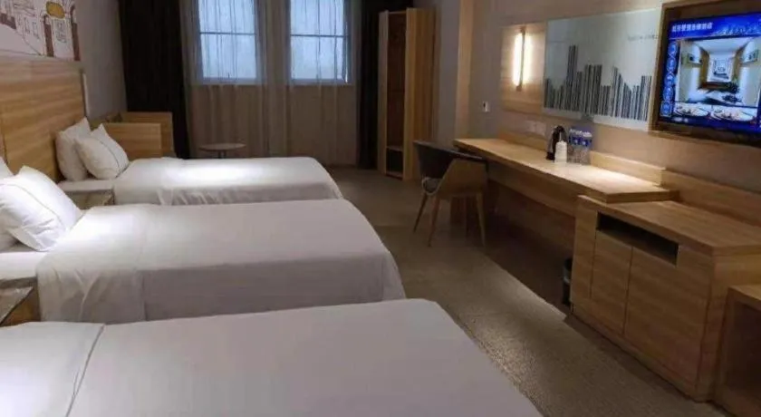 Bed in City Comfort Inn Jingzhou Railway Station Fantawild