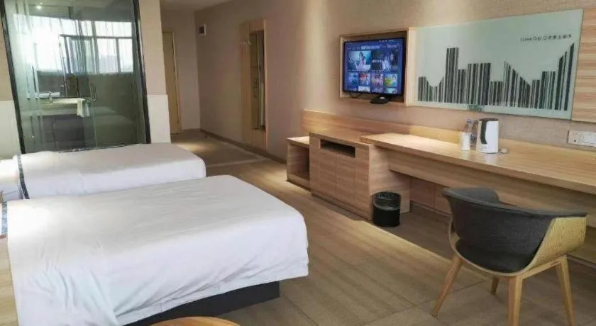 Bed in City Comfort Inn Jingzhou Railway Station Fantawild