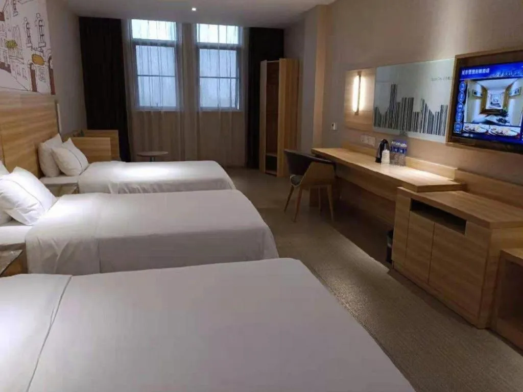 Bed in City Comfort Inn Jingzhou Railway Station Fantawild