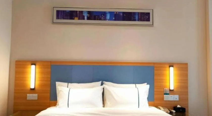 Bed in City Comfort Inn Deyang Shifang Yonghu Park