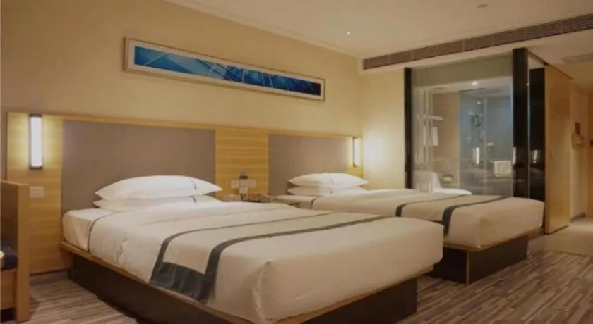 Bed in City Comfort Inn Deyang Shifang Yonghu Park