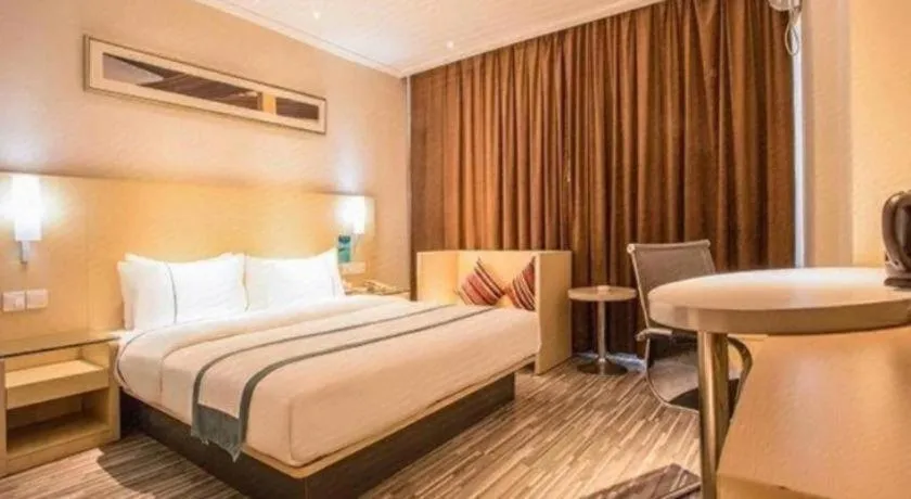 Bed in City Comfort Inn Deyang Shifang Yonghu Park