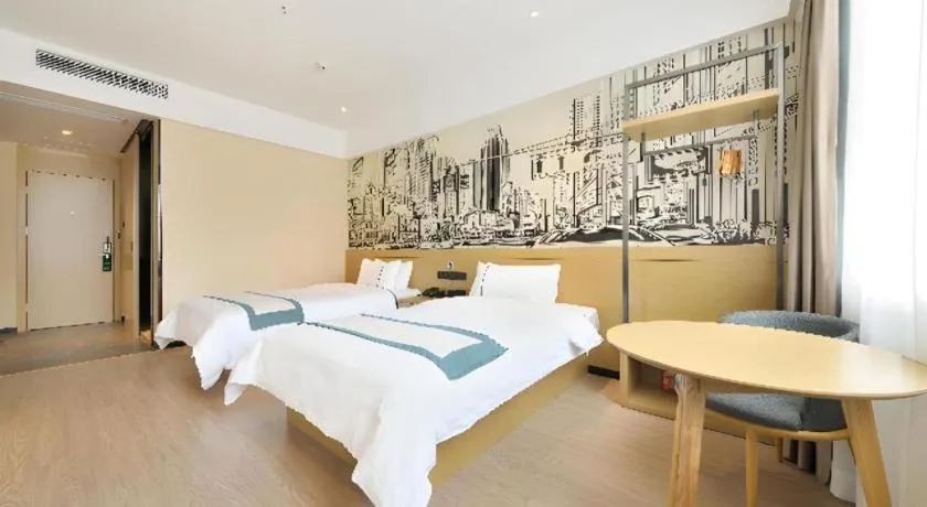 Bed in City Comfort Inn Wuhan Xinzhou Mo'er Cheng