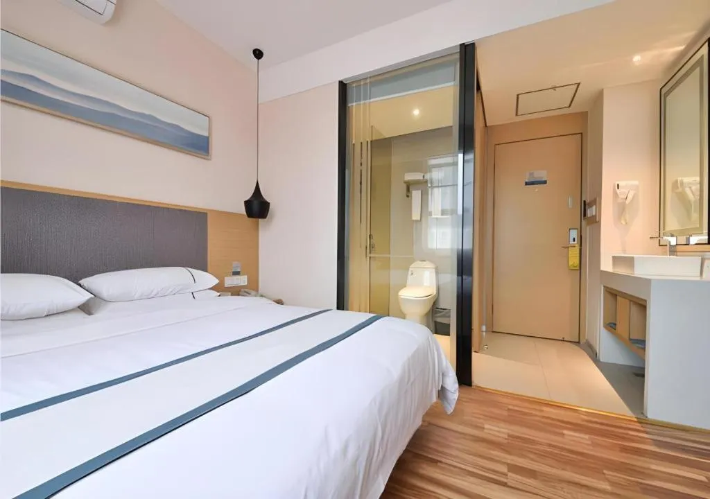 Bed in City Comfort Inn Wuhan Xinzhou Mo'er Cheng