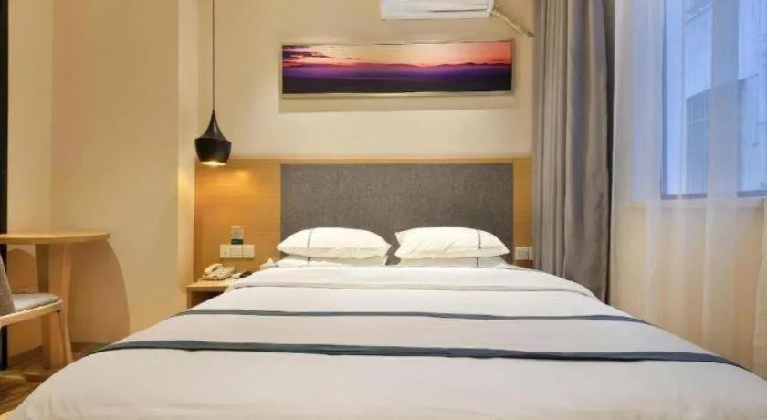 Bed in City Comfort Inn Wuhan Xinzhou Mo'er Cheng