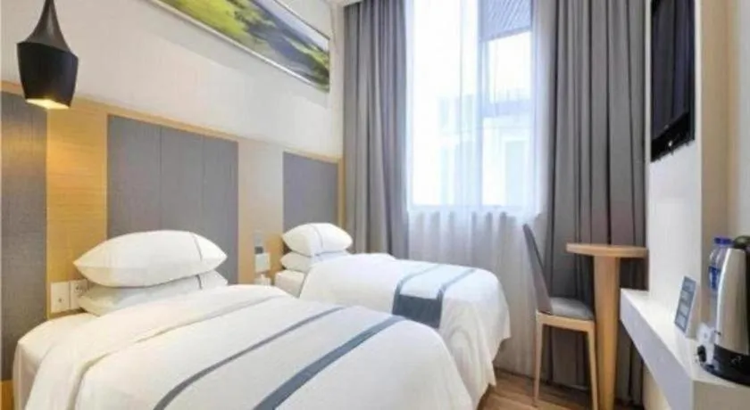 Bed in City Comfort Inn Wuhan Xinzhou Mo'er Cheng