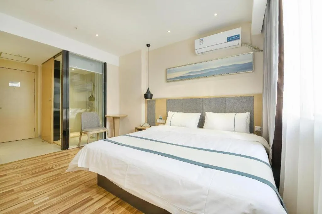 Bed in City Comfort Inn Wuhan Xinzhou Mo'er Cheng