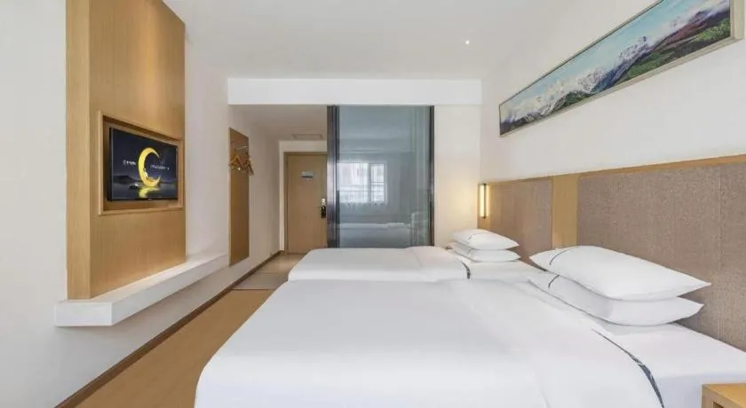 Bed in City Comfort Inn Wuhan Xinzhou Mo'er Cheng