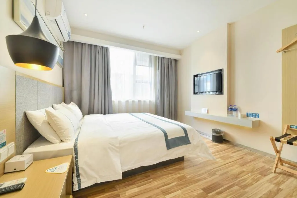 Bed in City Comfort Inn Wuhan Xinzhou Mo'er Cheng