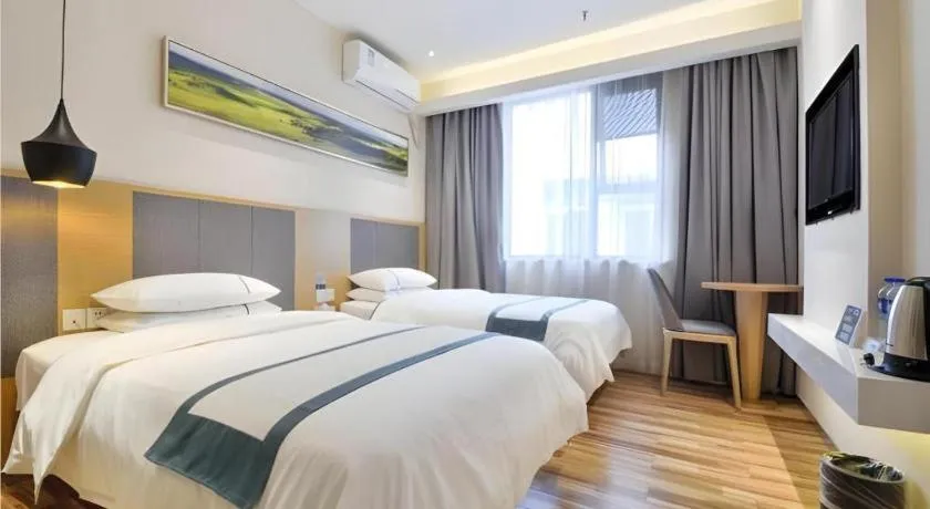 Bed in City Comfort Inn Wuhan Xinzhou Mo'er Cheng