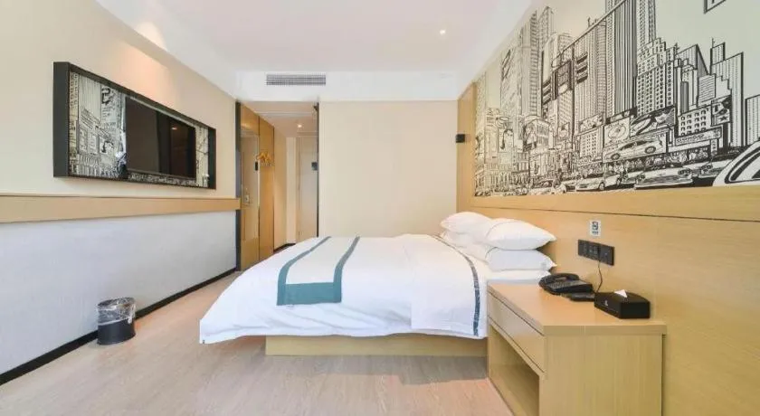 Bed in City Comfort Inn Wuhan Xinzhou Mo'er Cheng