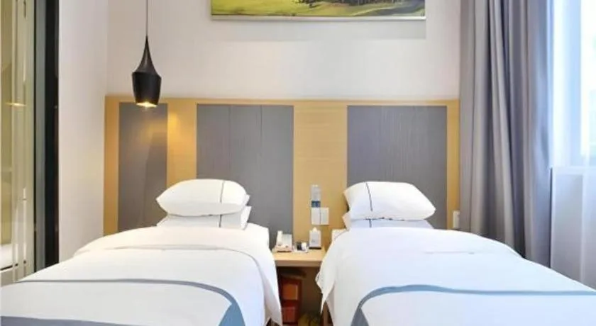 Bed in City Comfort Inn Wuhan Xinzhou Mo'er Cheng