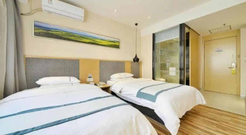 Bed in City Comfort Inn Wuhan Xinzhou Mo'er Cheng