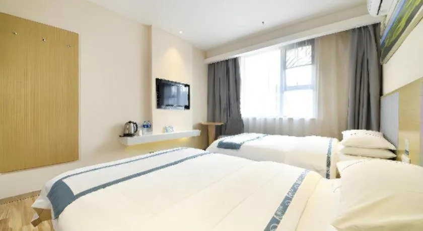 Bed in City Comfort Inn Wuhan Xinzhou Mo'er Cheng