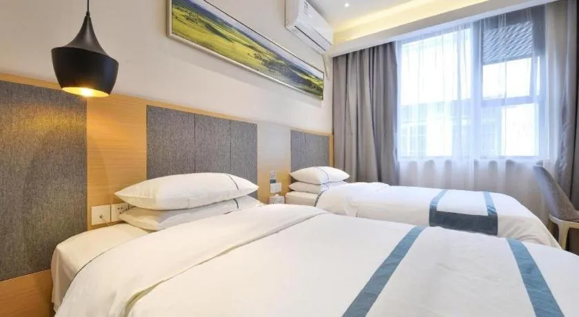 Bed in City Comfort Inn Wuhan Xinzhou Mo'er Cheng