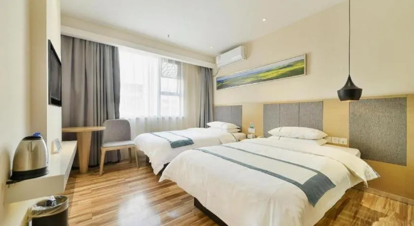 Bed in City Comfort Inn Wuhan Xinzhou Mo'er Cheng