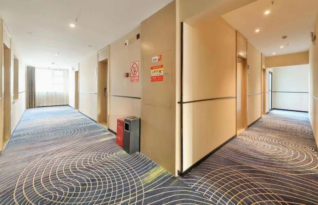 Bed in City Comfort Inn Wuhan Xinzhou Mo'er Cheng