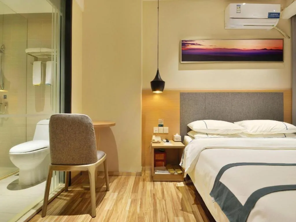 Bed in City Comfort Inn Wuhan Xinzhou Mo'er Cheng