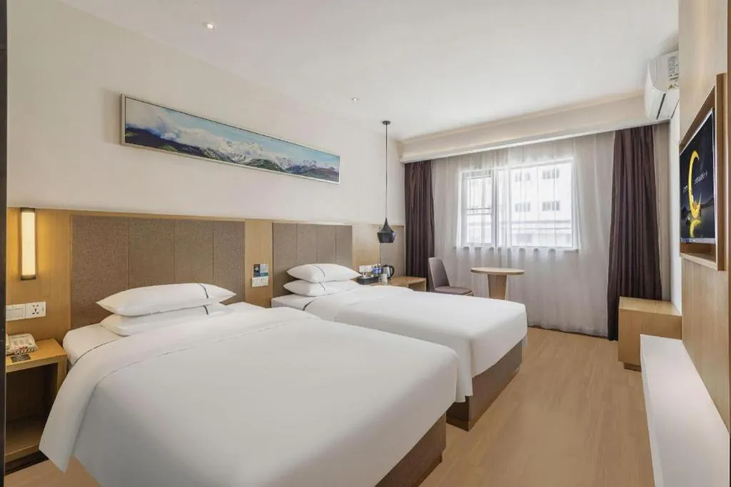 Bed in City Comfort Inn Wuhan Xinzhou Mo'er Cheng